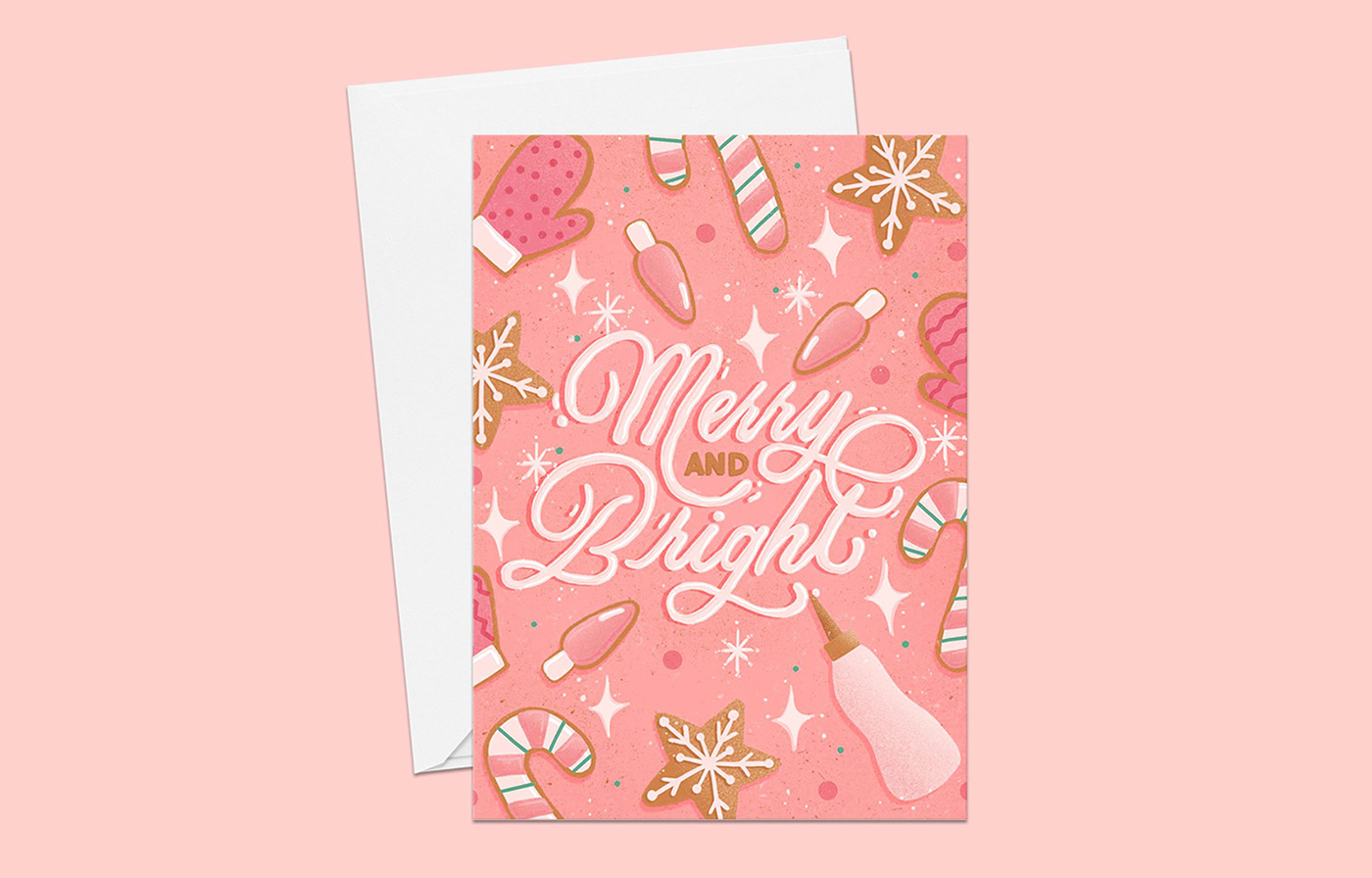 Greeting card featuring festive frosting hand lettering and cookies