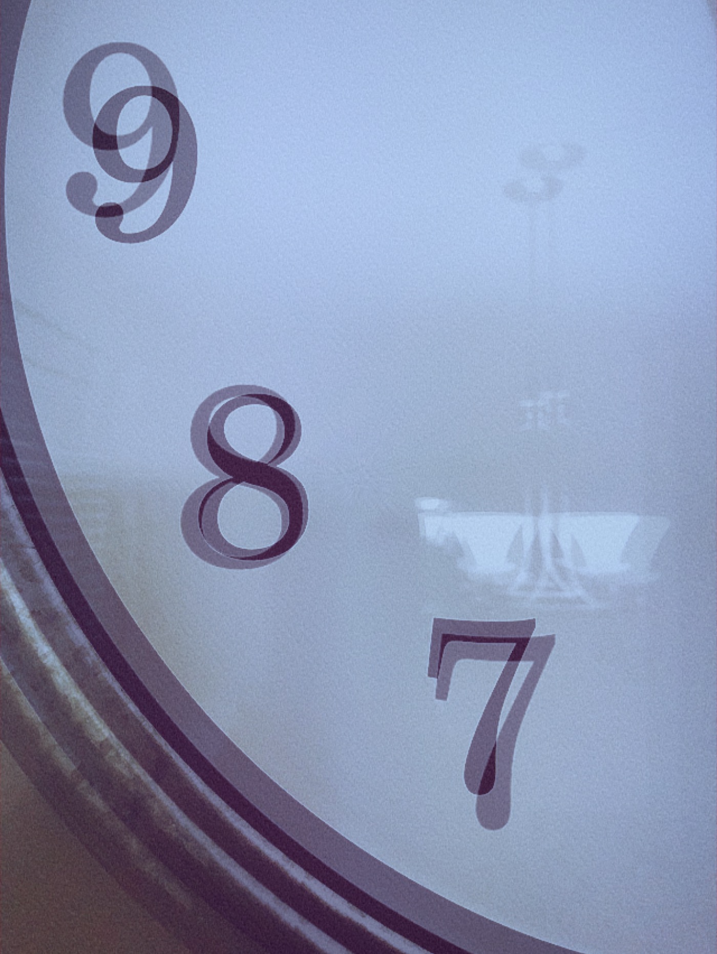 abstract time reflecting clock face Macro Photography glass