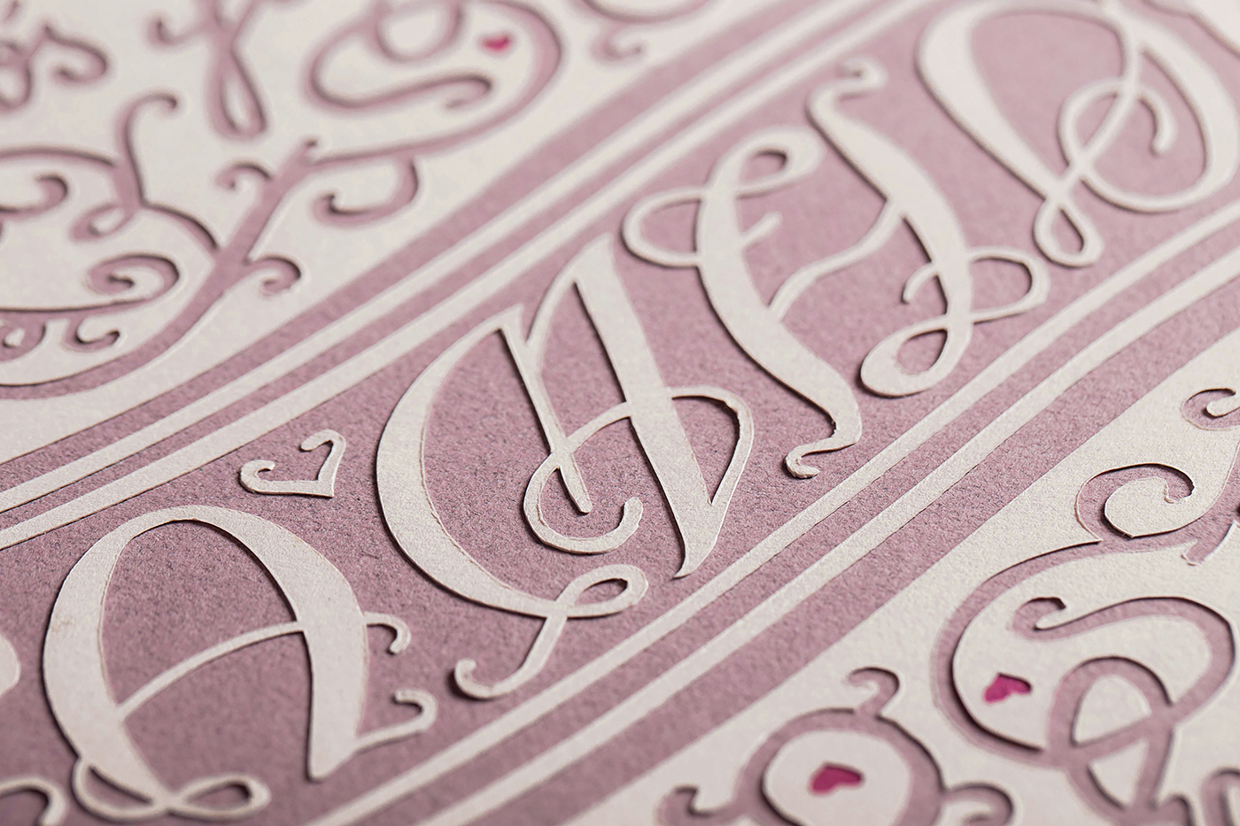 poster paper-cut pink paper White cursive detail ornament