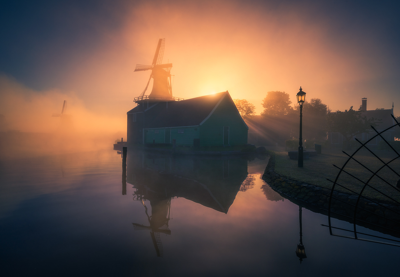 dutch windmill zaanse schans amsterdam The Netherlands fog