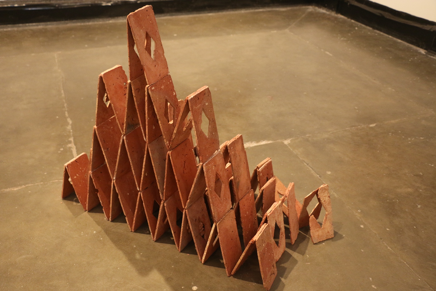 minimalist art sculpture bricks terracotta red fragility house of cards thesis NCA