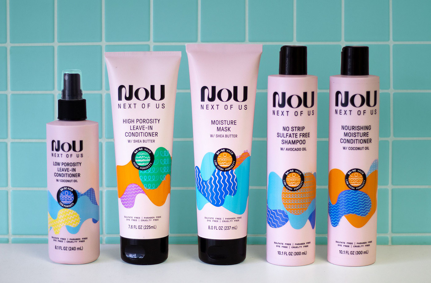 Full line of NOU hair care products, showcasing packs created by a product packaging design agency.