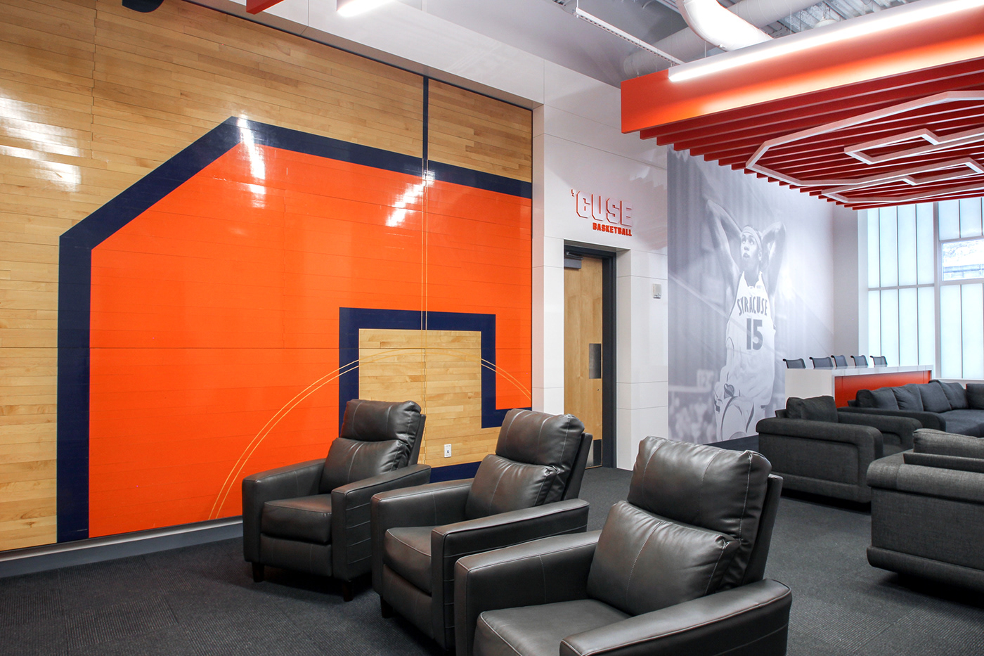 Syracuse University orange college basketball lounge environmental graphics Experiential design sports branding  interior design 