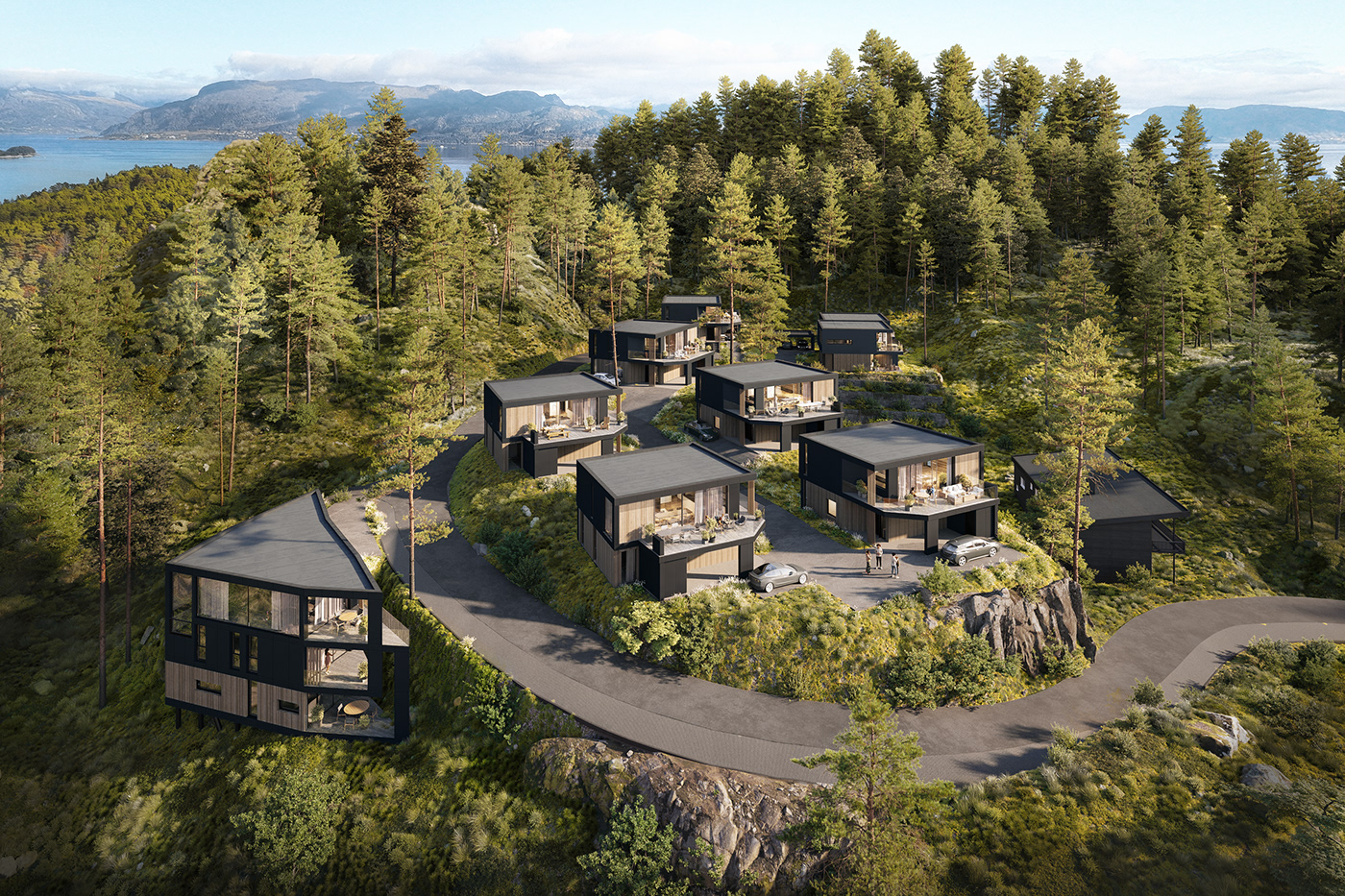 Aerial view of the modern building nestled in Norway's scenic Bergen forest, with the  sea.