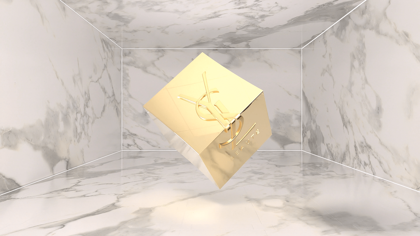 Yves Saint Laurent Gold Cube in a marble room