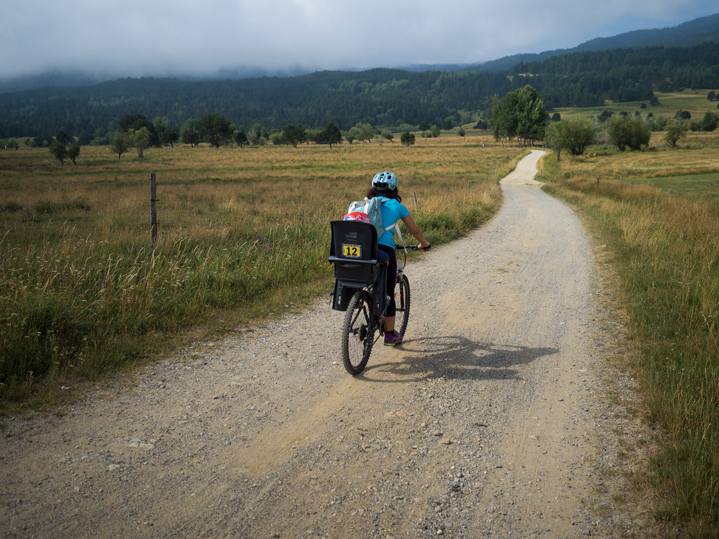 bike family bikepacking family pedaling together