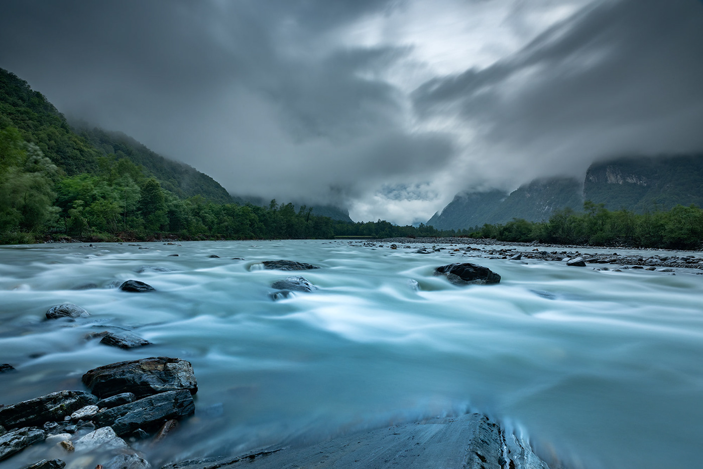 Dramatic and moody landscape photography of the Maggia Valley in Ticino by Jennifer Esseiva.