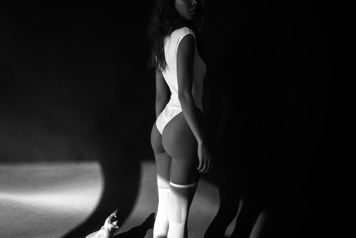 person portrait body indoor black background posing woman girl
