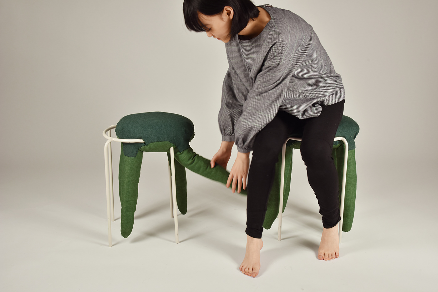 Playful dark spirit stool furniture upholstery offset stretch