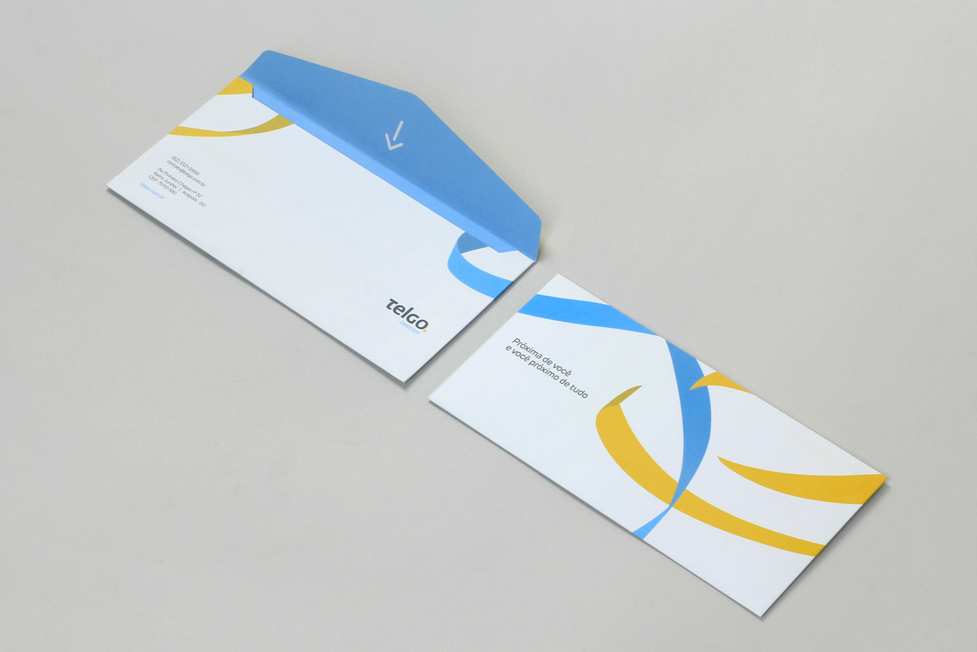 brand positioning brand identity Corporate Visual Identity yellow blue ribbons Telecom telecommunications Internet icons Minimalism