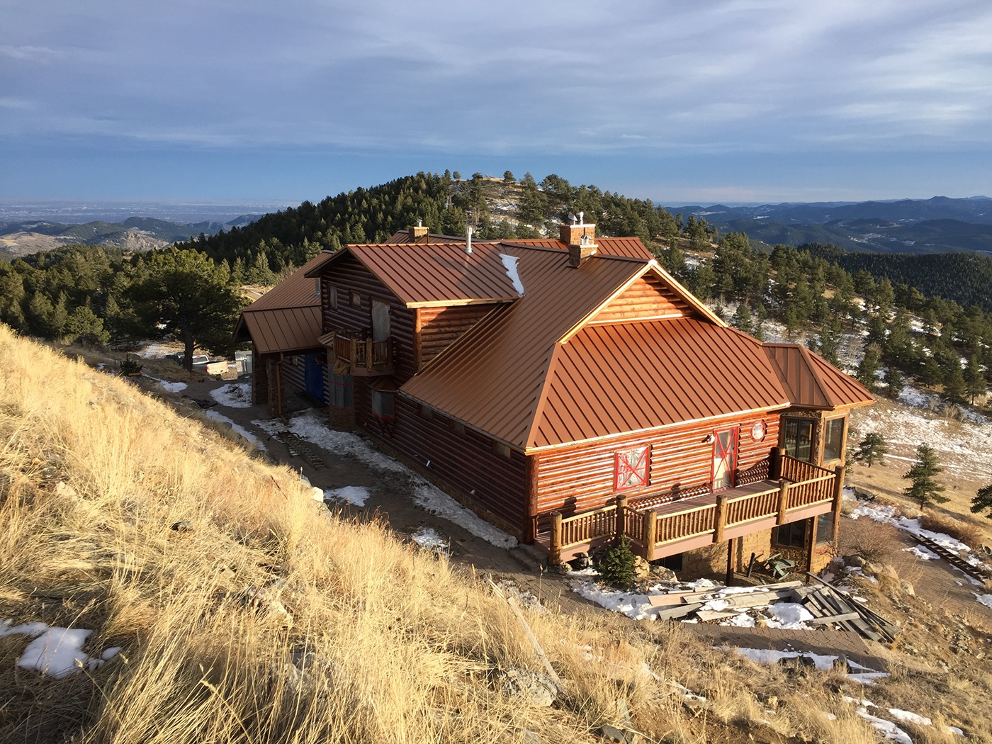 Log Home cabin Colorado staining sealing protecting sikkens siding