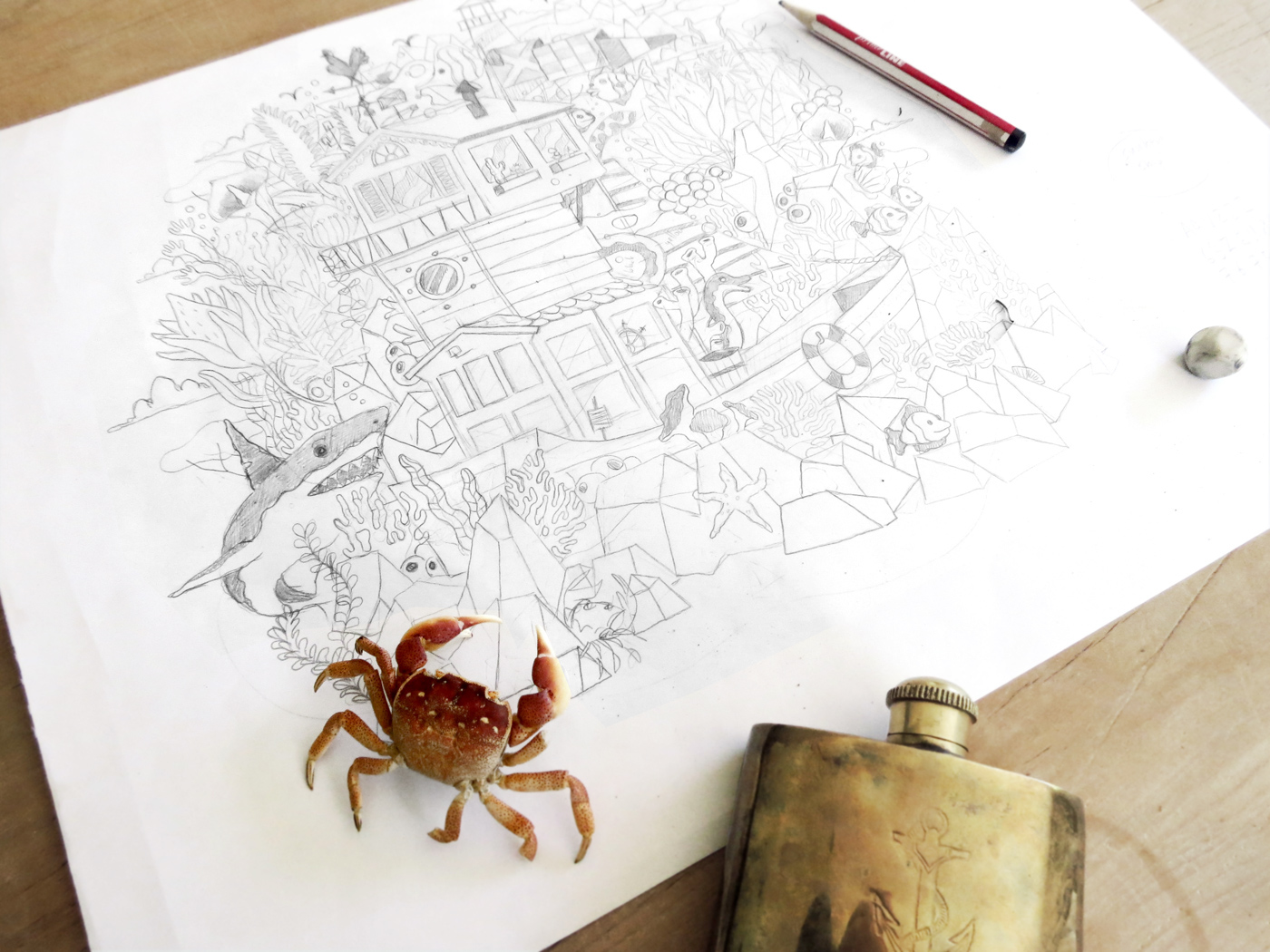 Process pencil sketches on paper with nature and underwater sunken ship and ocean wildlife and fish.