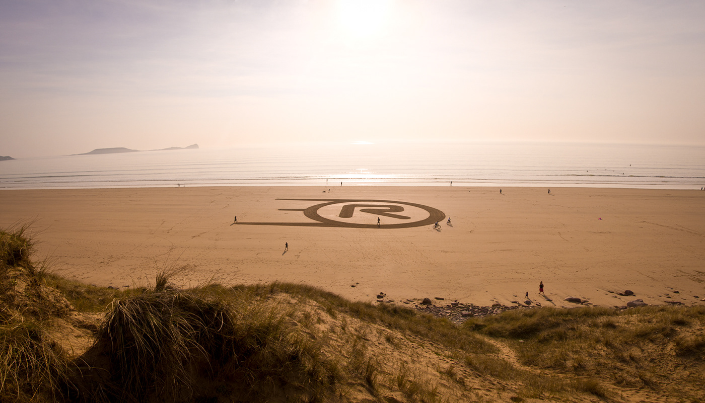 sand rushes beach sculpture land art crop circle