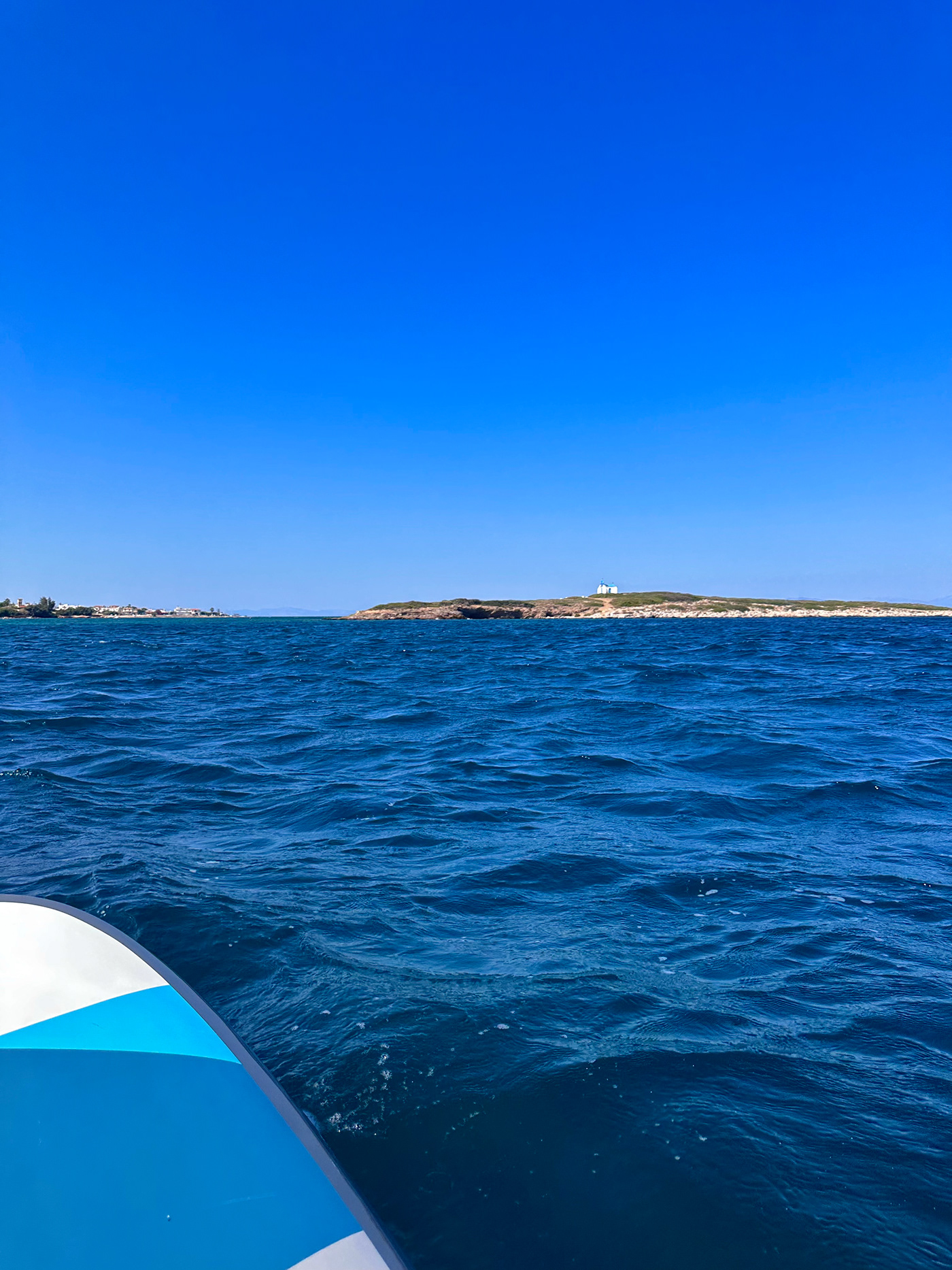 Greece Travel travel photography summer blogger Island church Social media post paddleboard watercraft