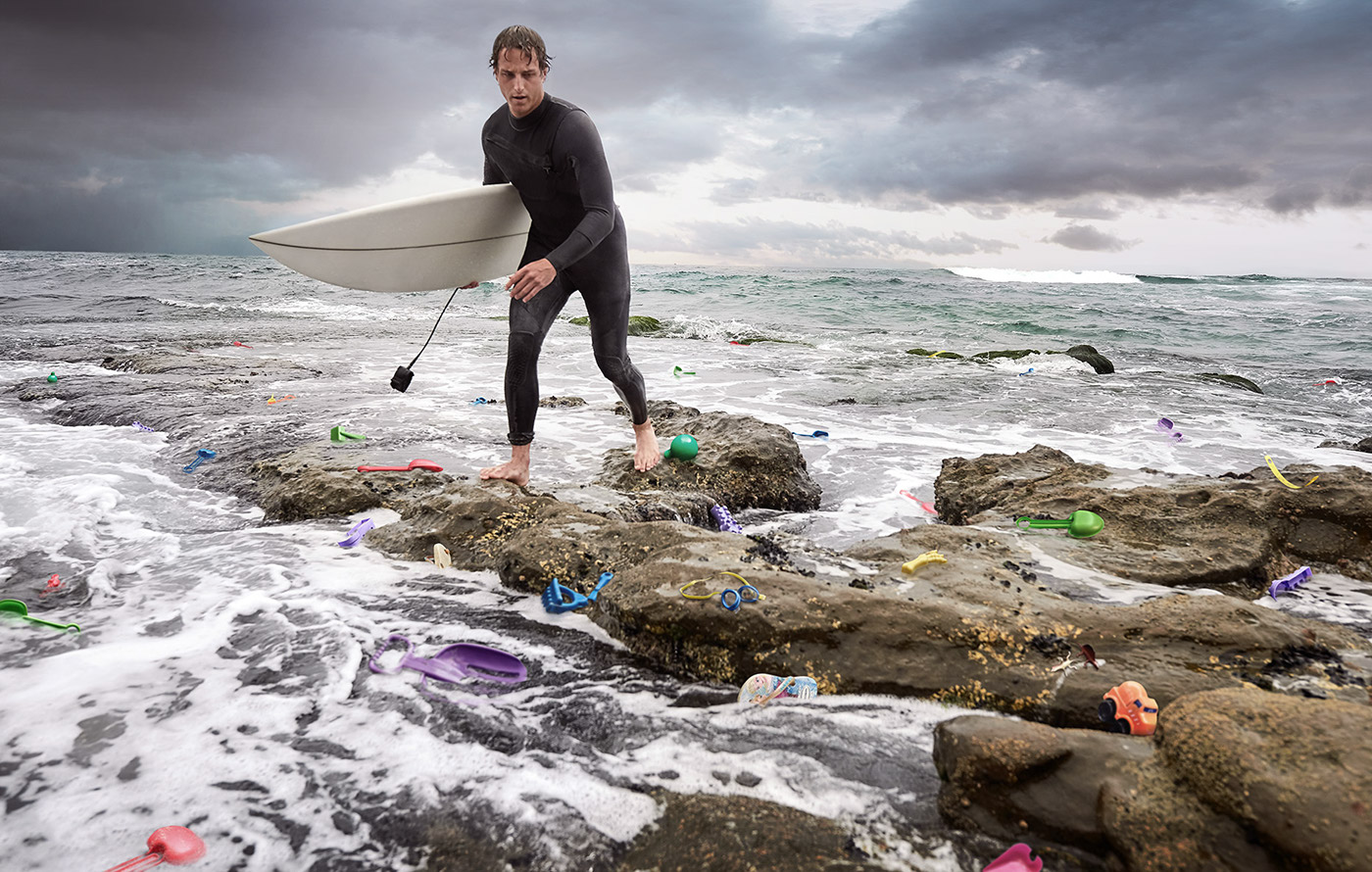 surfing plastic pollution water beach conceptual Ocean trash bags bottles
