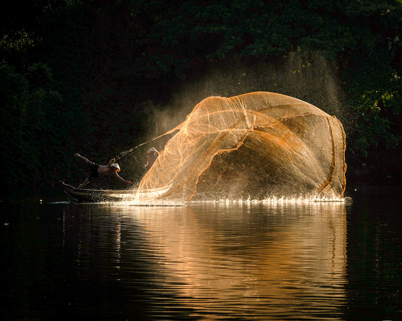 Fisherman net action light river water catching fishing