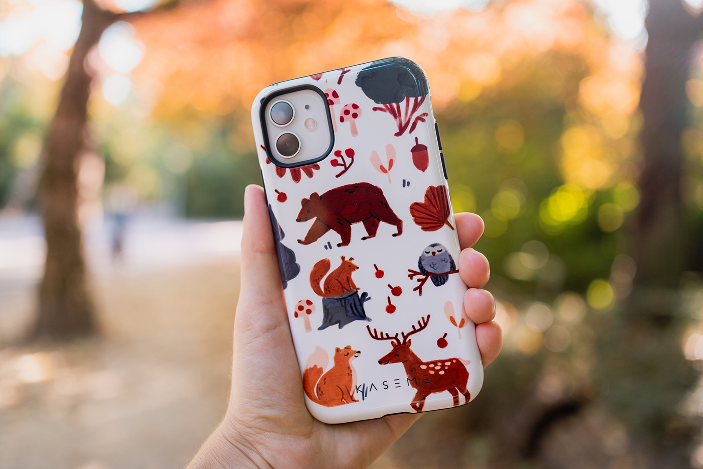 Hand painted illustration of woodland animals printed on a phone case by Kase Me Design.