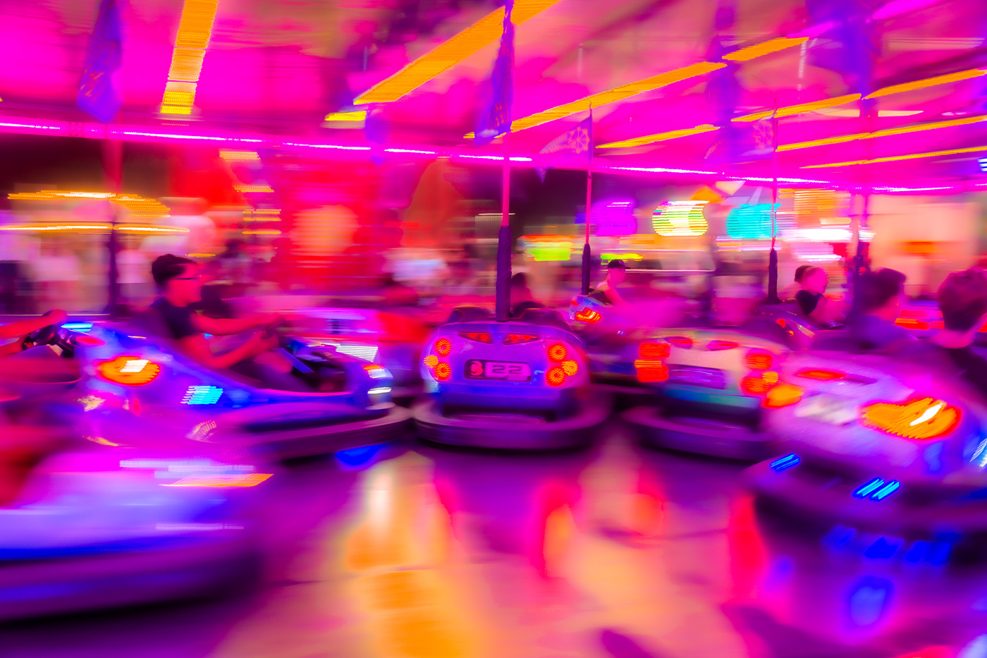 bumper cars colorful fun Fair people ICM abstract