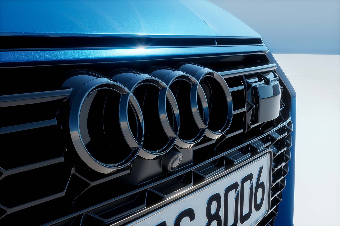 the front bumper close up for audi car with dark chrome audi rings.