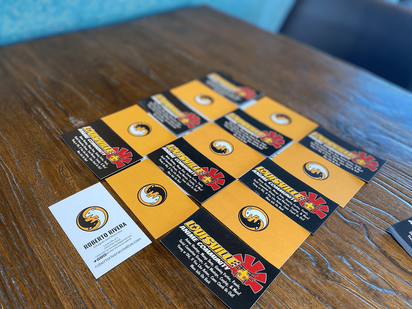 Lined up my personal business cards with my anime logo cards. Yellow is my favorite color.