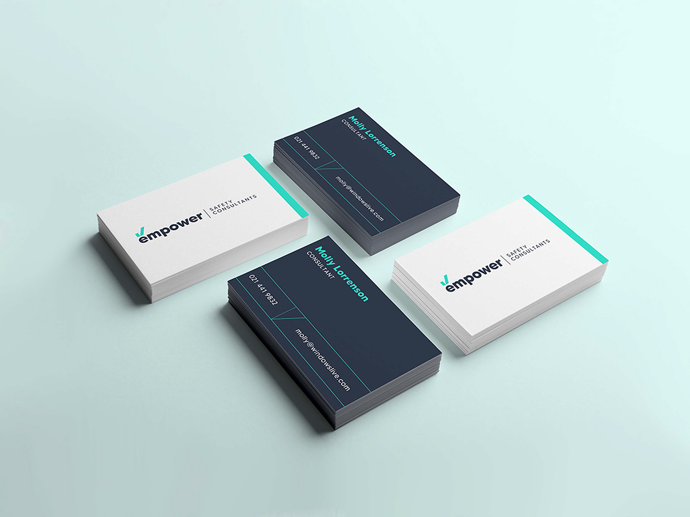 Floating pile of business cards in navy blue and simple details on top