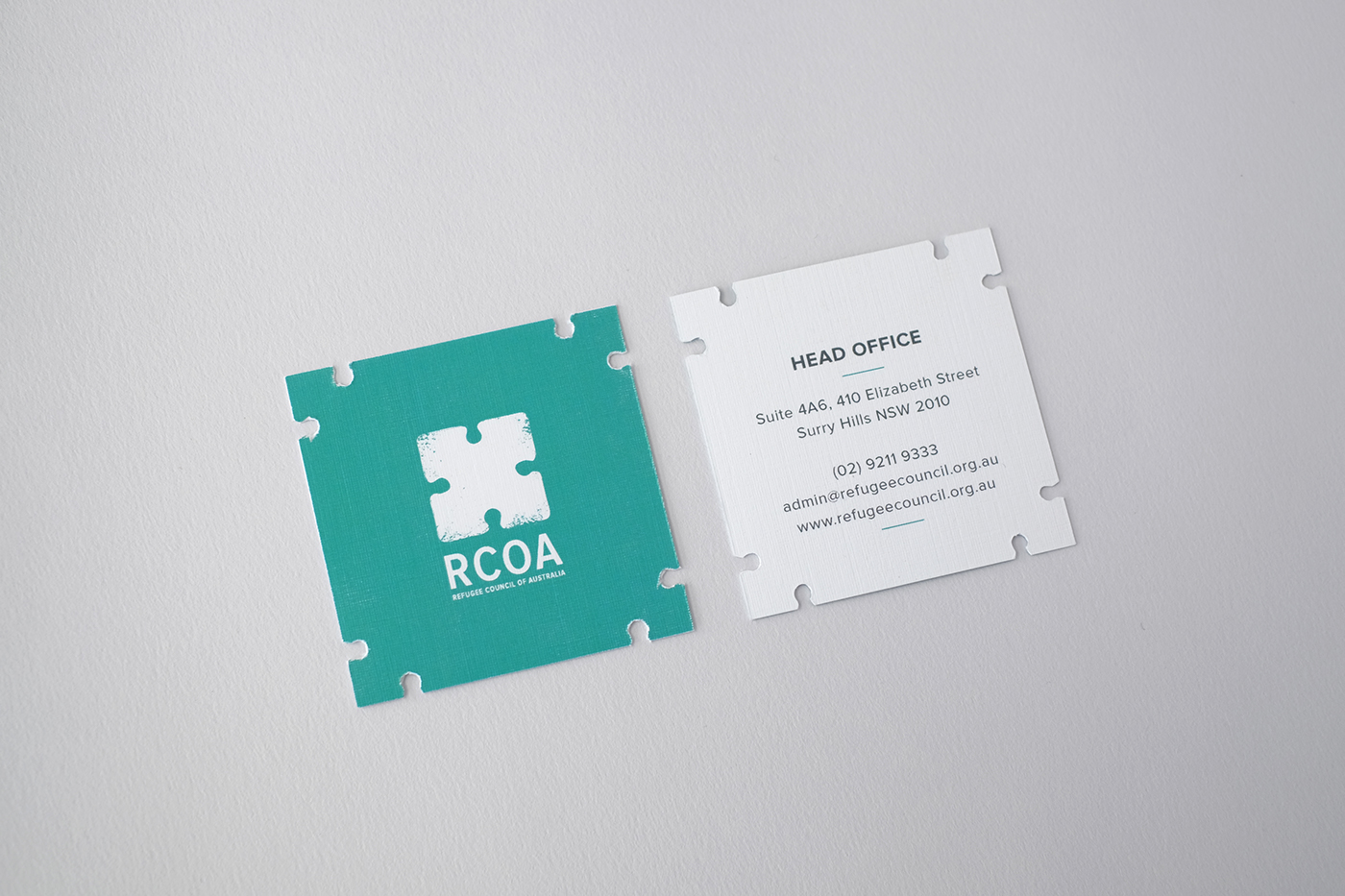 RCOA refugee logo identity refugee logo puzzle logo arrow logo human logo refugee council logo with stationary turquoise