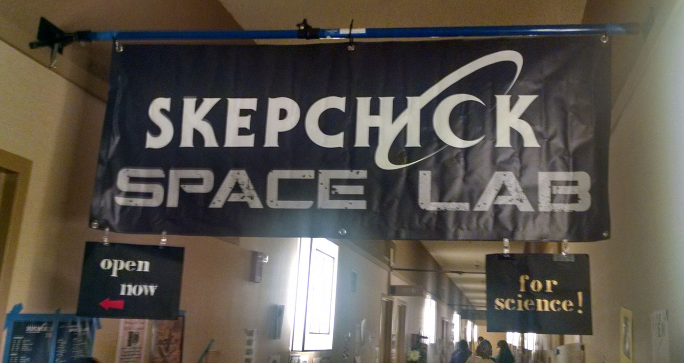 SkepchickCon convergence logo Space  convention Scifi