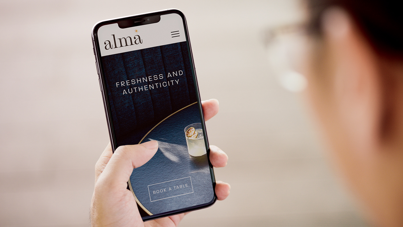 Smartphone version of the Alma Restaurant website.