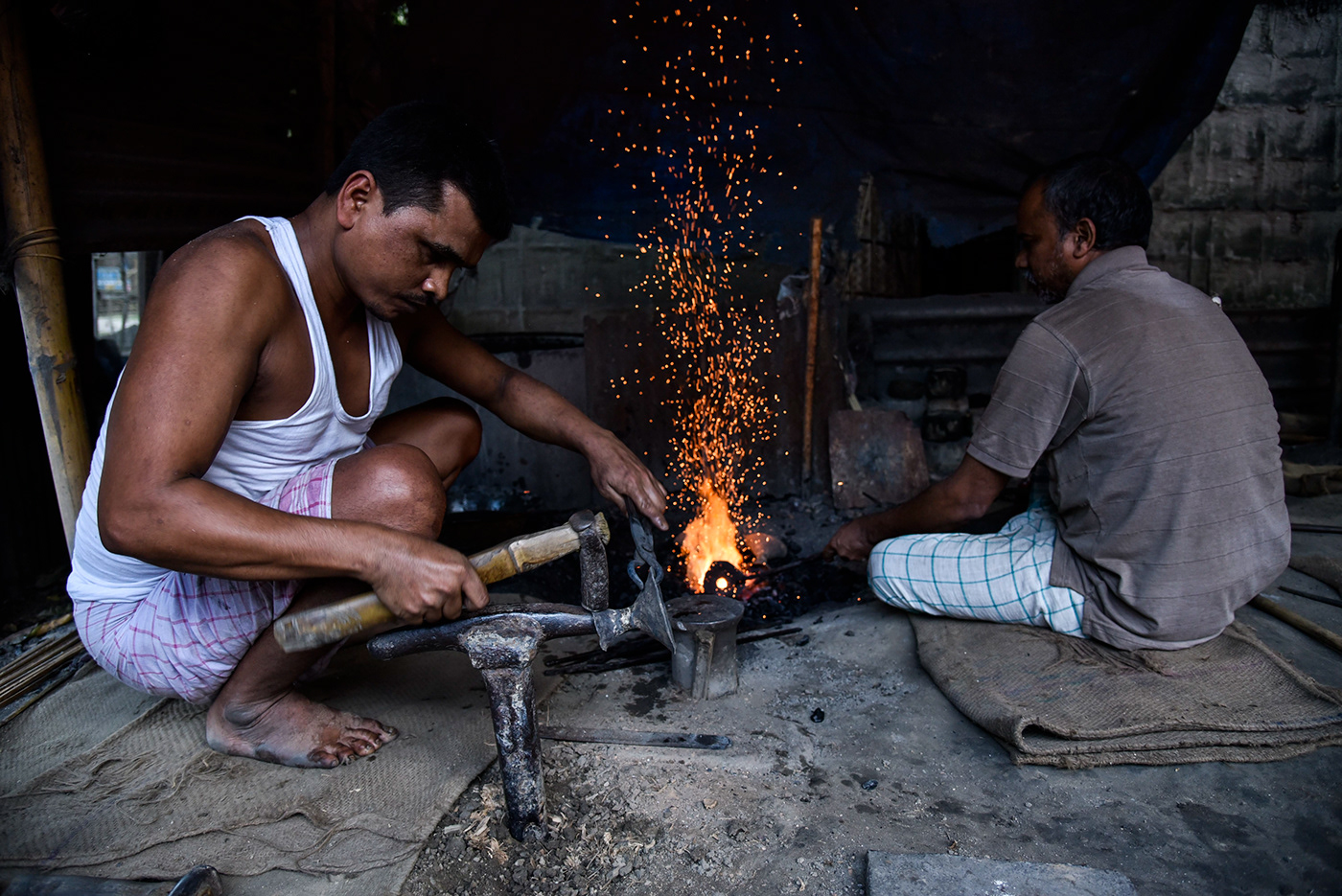 Bell metal people worker Workshop India assam handicraft