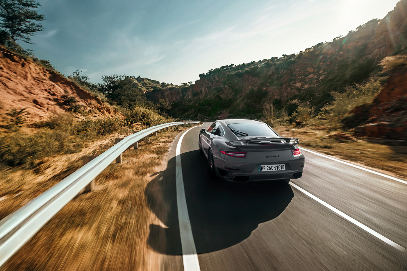 Porsche 911 in the mountains and aravali hills

