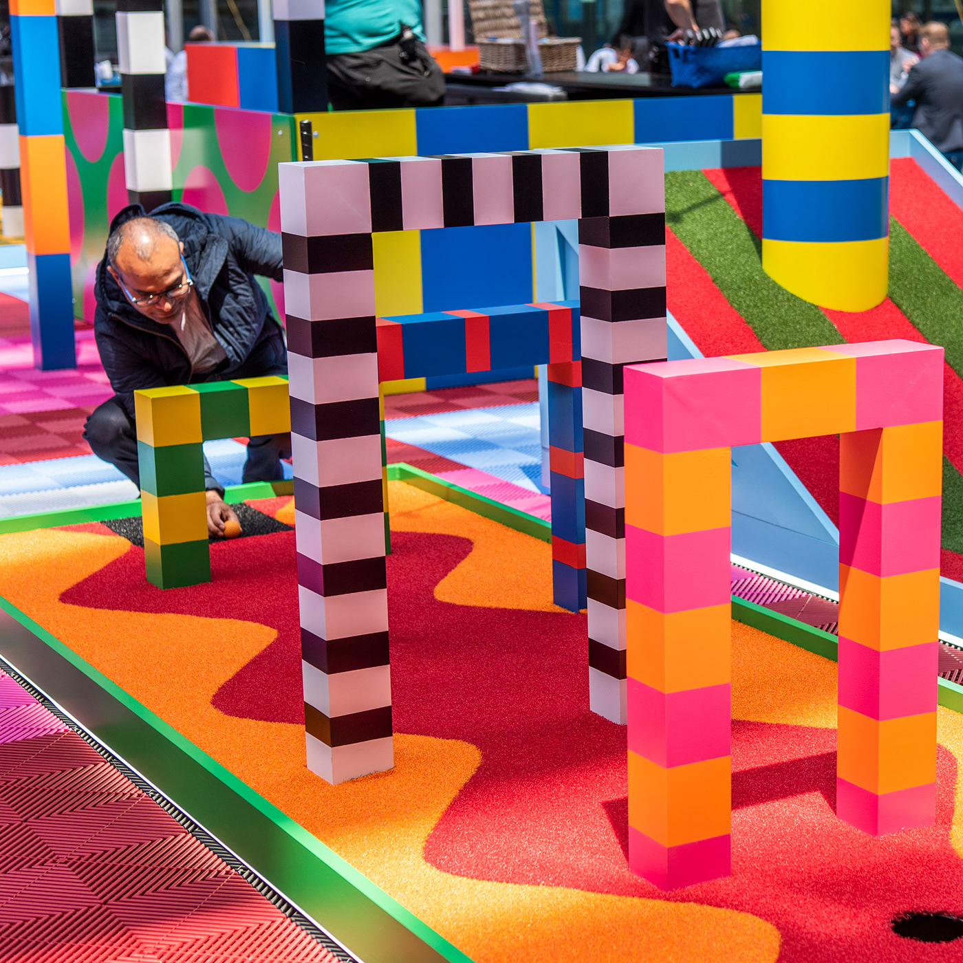 colorful immersive installation interactive mini golf pattern Playground sculpture