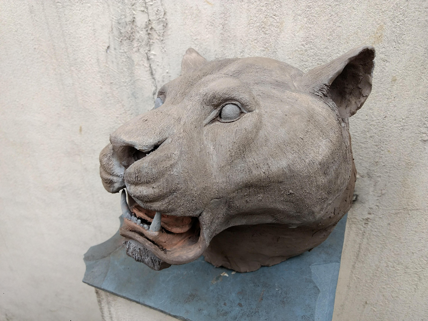sculpture clay animal lioness