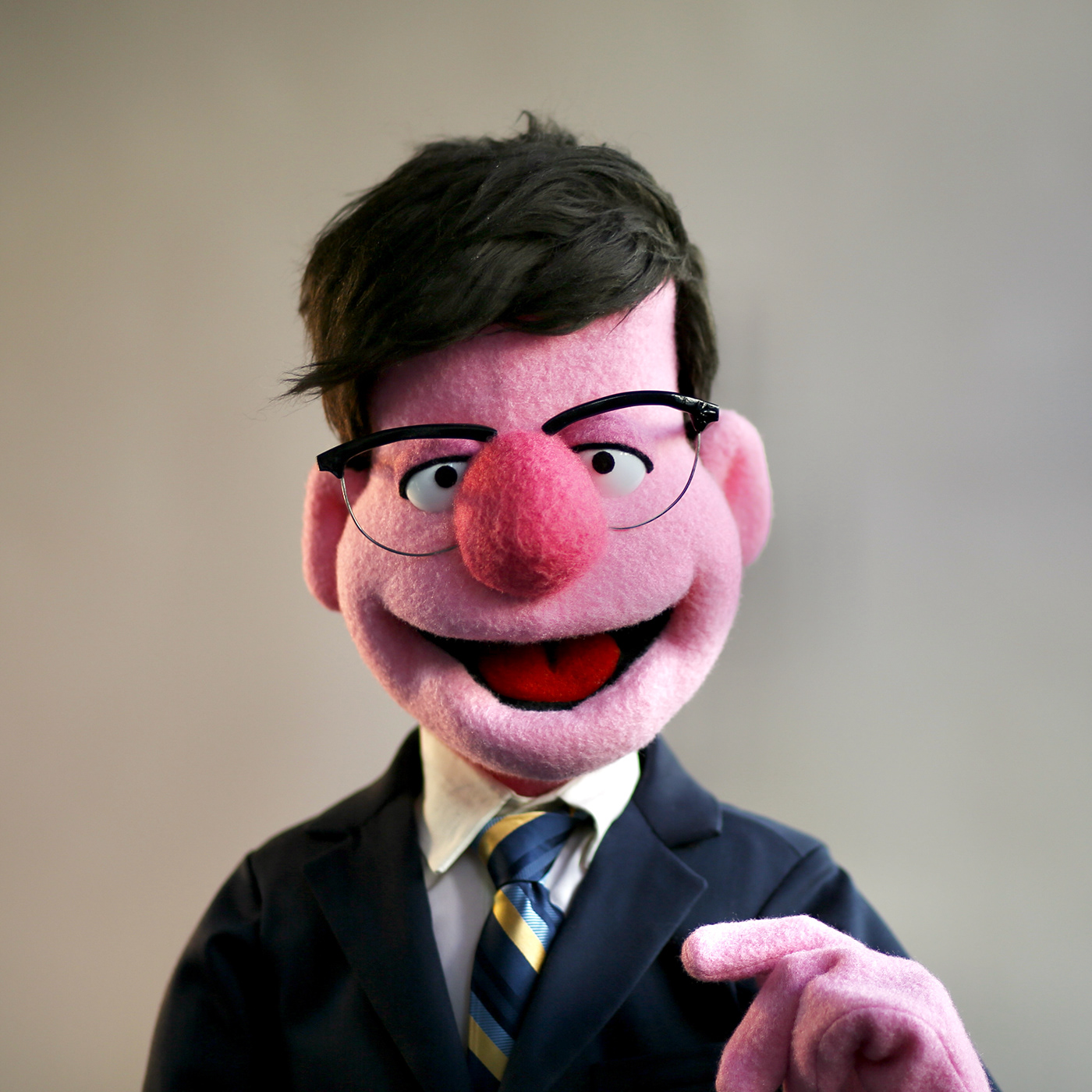 custom puppet of TV anchor