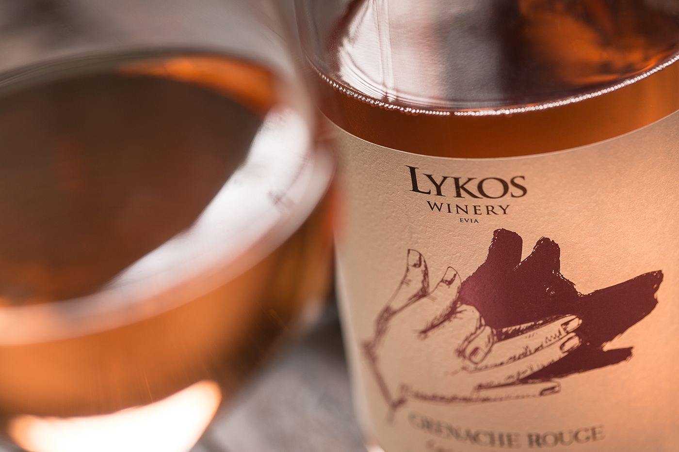 lykos winery wolf wine label greek wine assyrtiko bottle sophiagdotcom sophia georgopoulou design shadow play hands