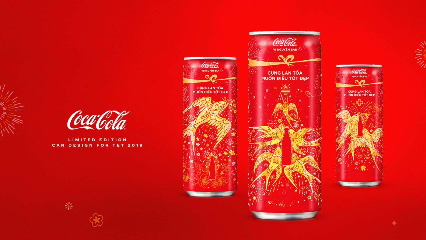 Coke can design using golden swallows and other Tet motifs.