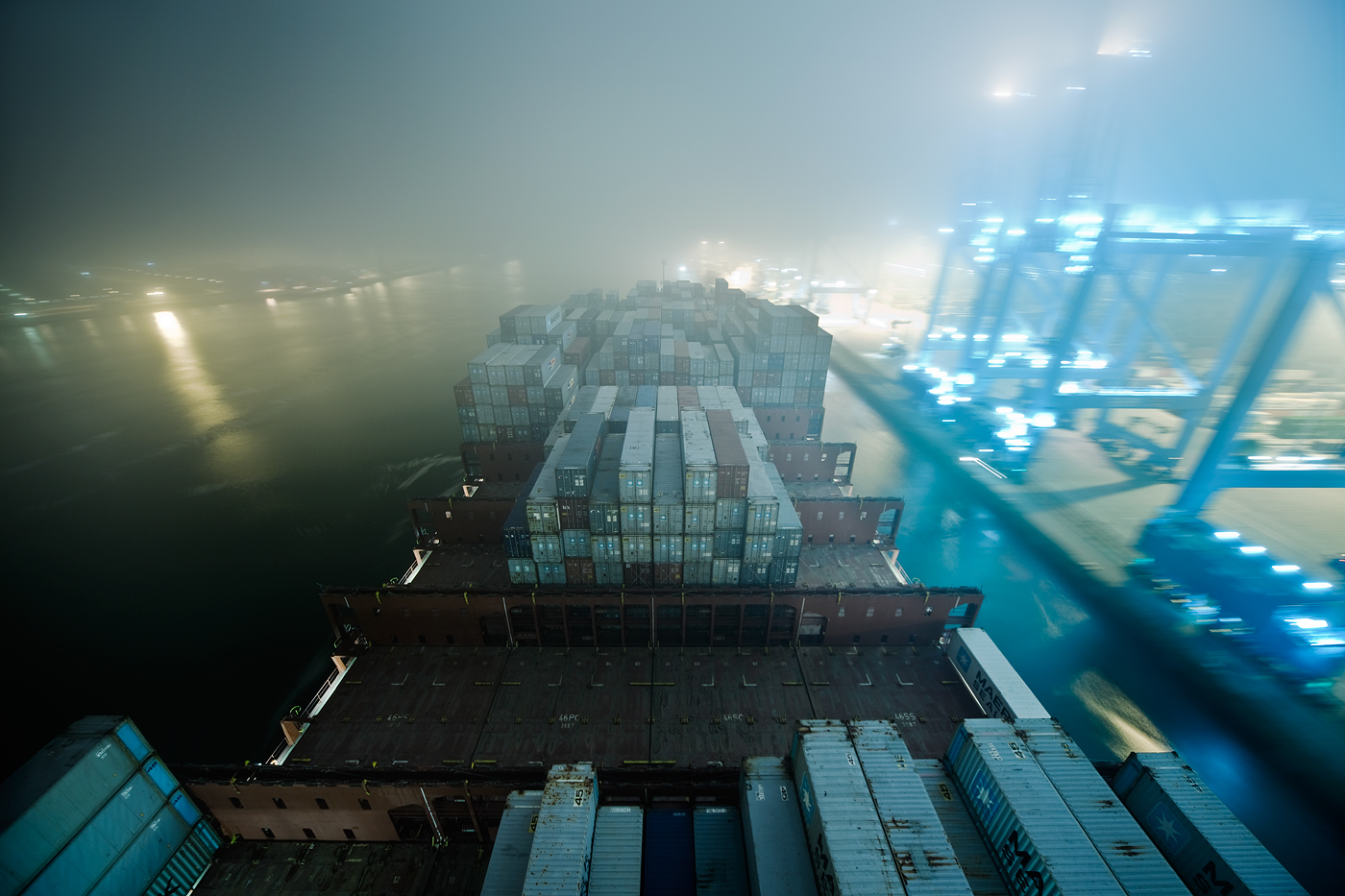 Container ship Rotterdam Port of Felixstowe Netherlands English Channel container shipping world's largest containership port habor mist fog logistic globalisation North Sea