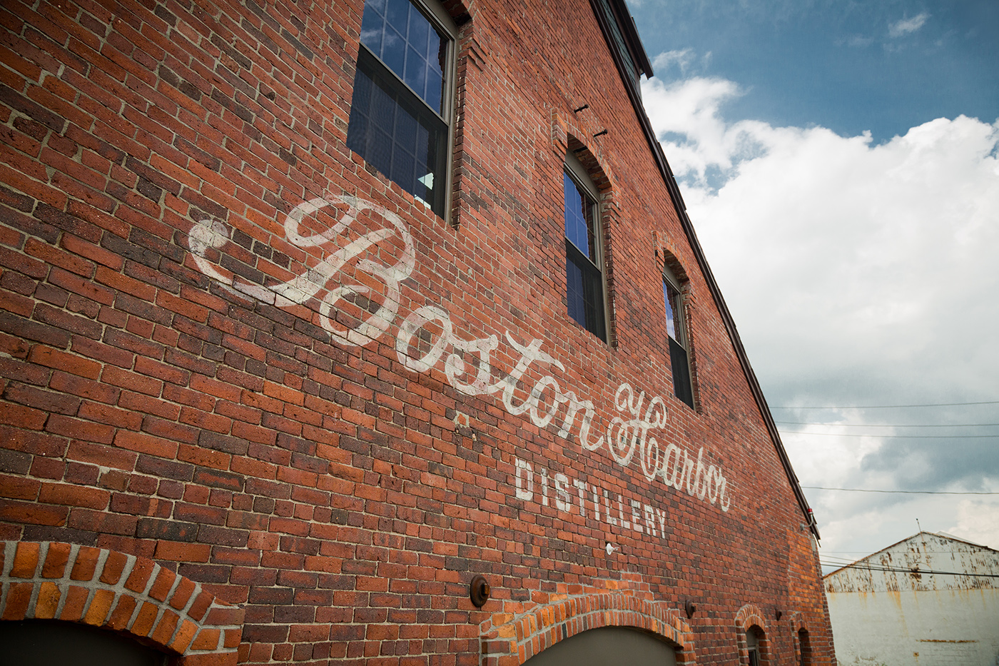 brand identity logo distillery craft distillery boston liquor packaging New England lettering Script HAND LETTERING
