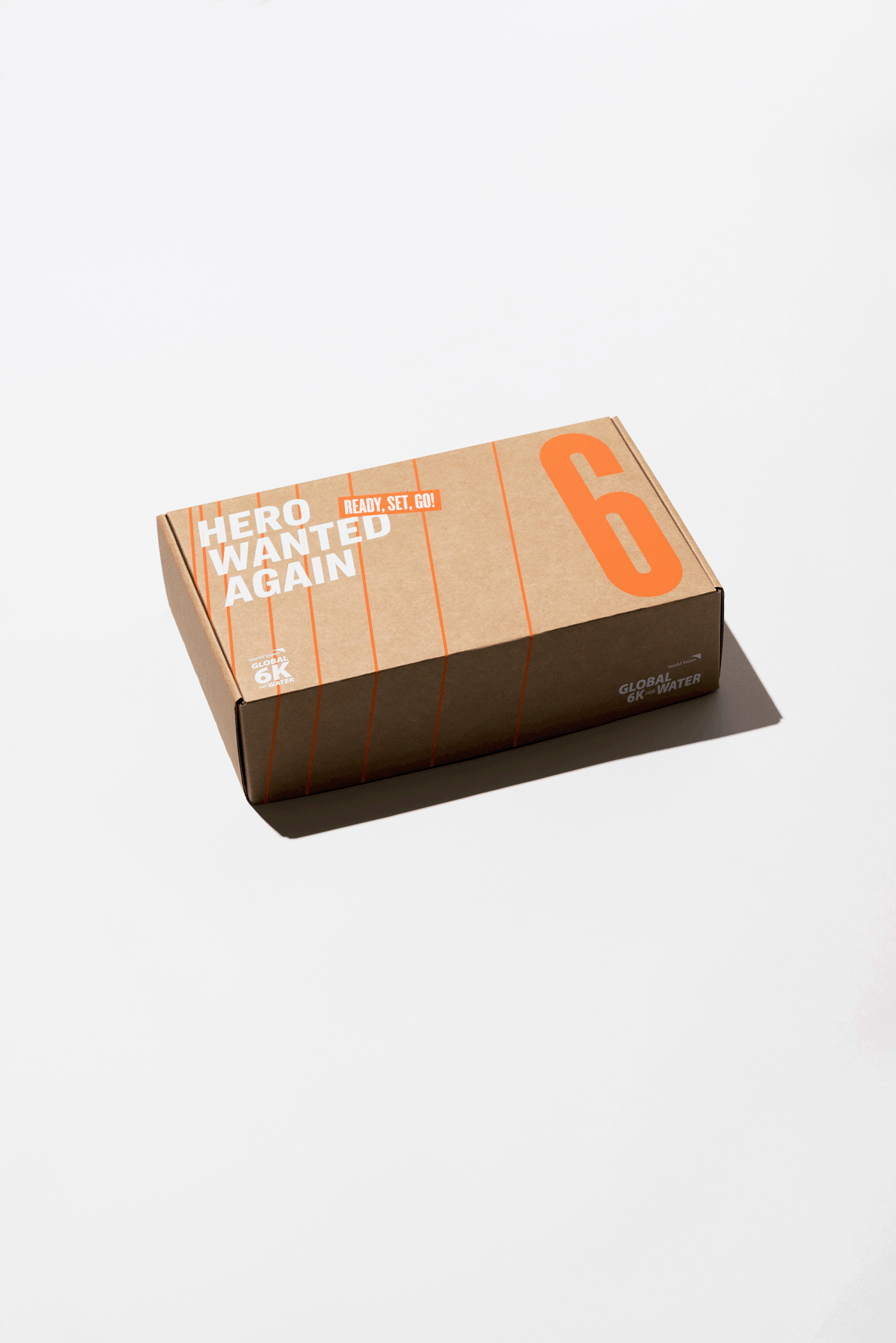 box condensed font Duotone Global 6K lines orange packaging design White World Vision