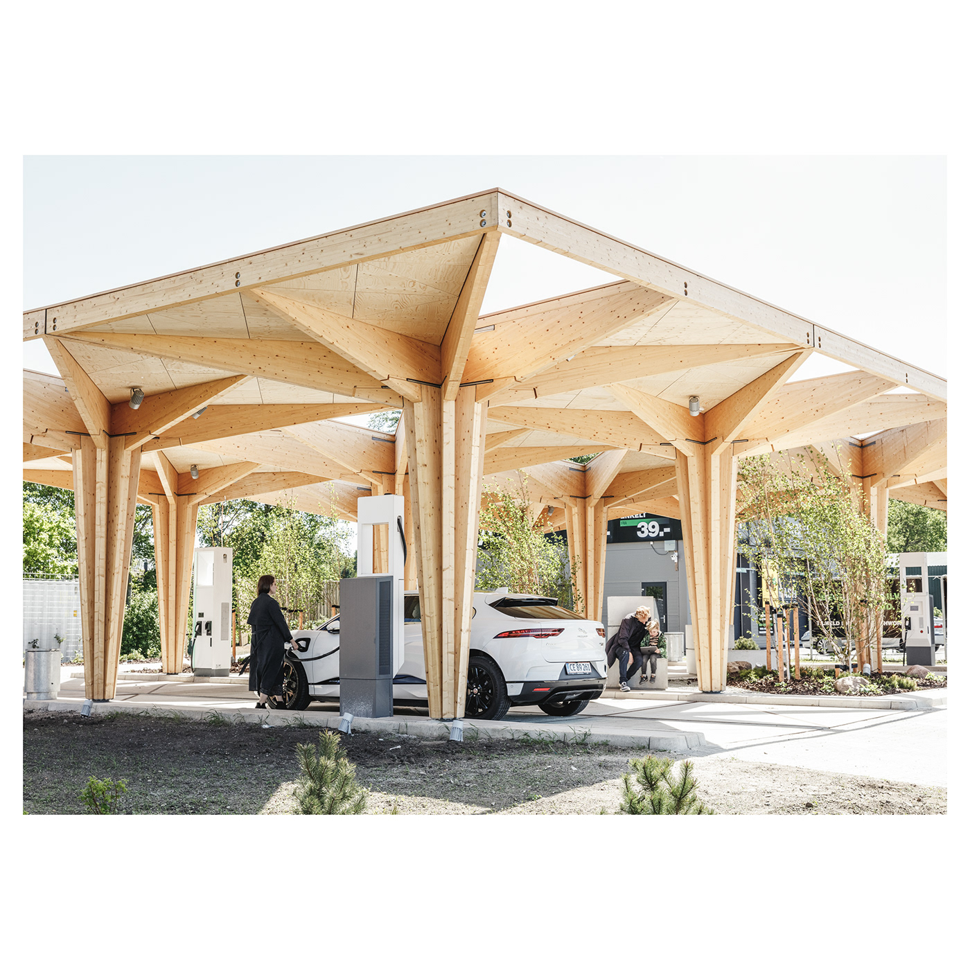 Electric Car charging station glulam wood Scandinavian design danish architecture architecture design STATION wood architecture