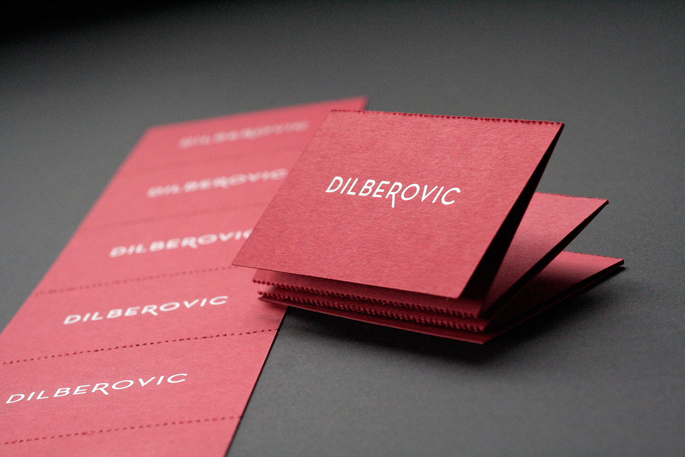 business card self service dilberovic ivan admit One perforated studio foil stamp card
