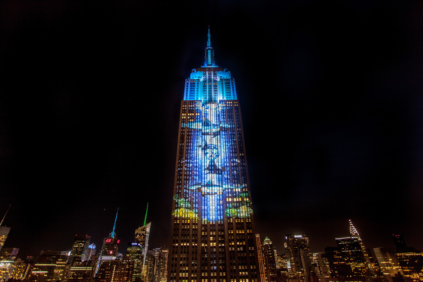Adobe Portfolio empire state building projection projection mapping obscura OPS Racing Extinction New York ESB Empire climate change Mapping