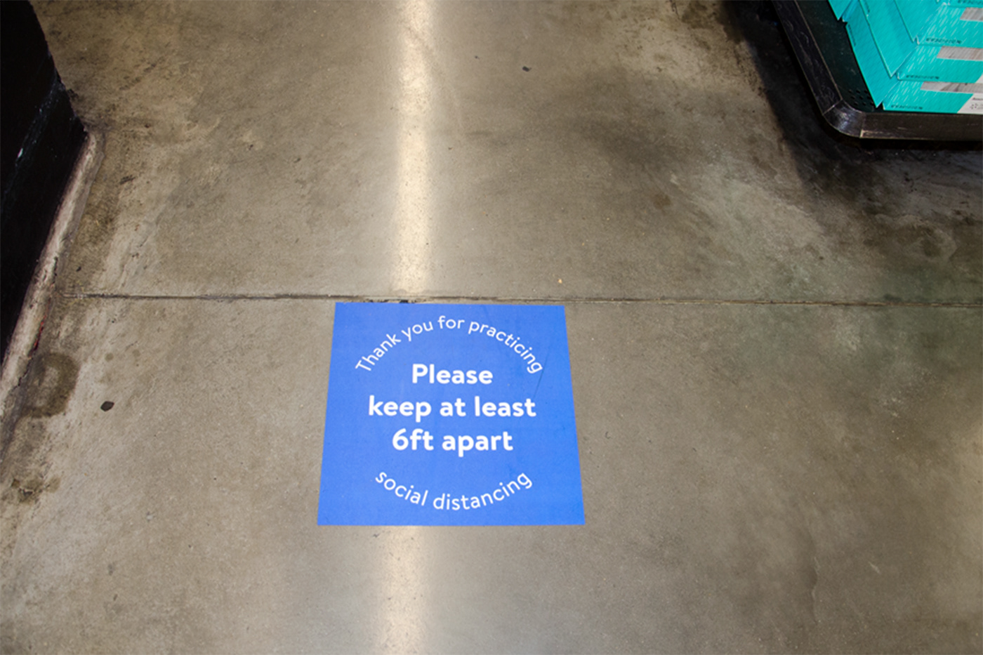 Many of the local supermarkets have created social distancing markers on the floor, requiring customers to stay six feet apart. The pic was taken at Walmart on H Street, NW. (Joseph Young)