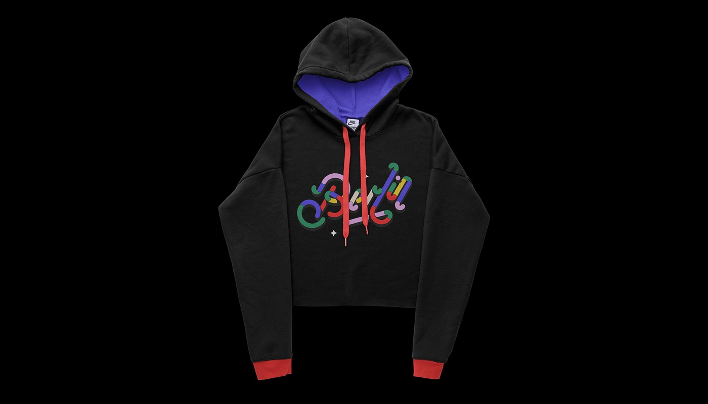 Crop hoodie apparel featuring illustrated custom typography design.