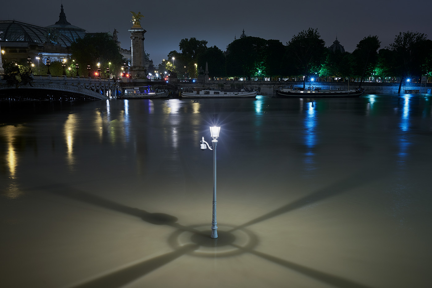 Paris seine river flood climate change climate disruption global warming monument daily life night