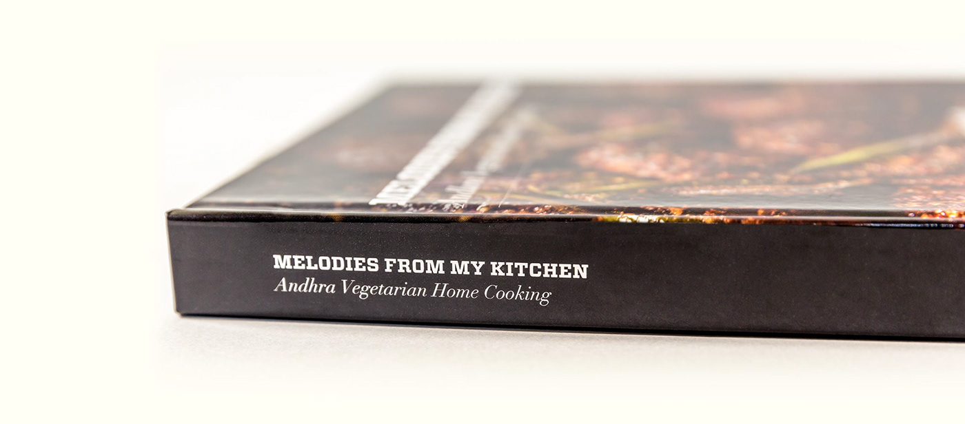 Spine of the book with the title text, Melodies from my kitchen, Andhra vegetarian home cooking.