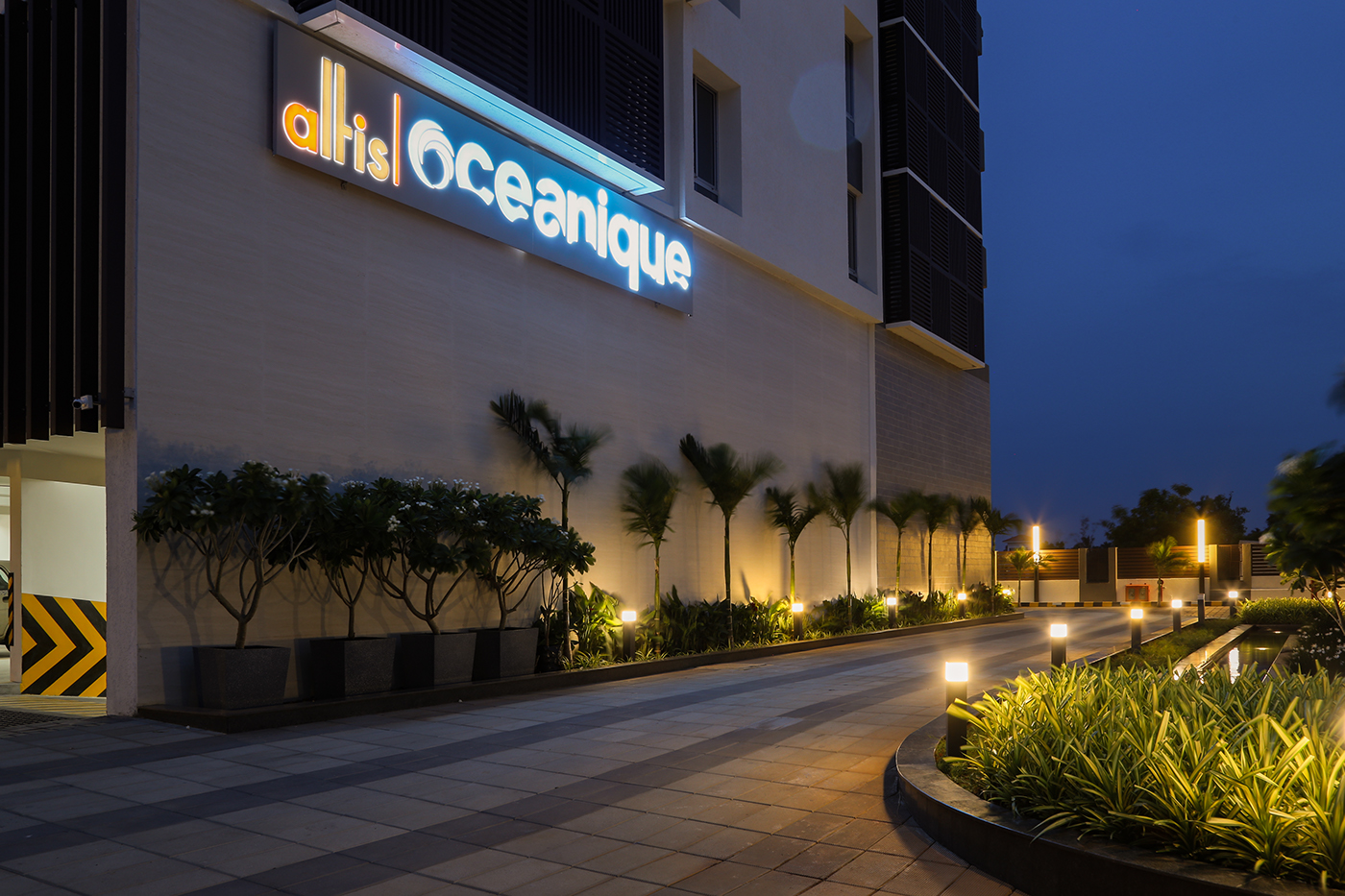 Oceanique ecr chennai luxury apartments highrise terrace landscaping night