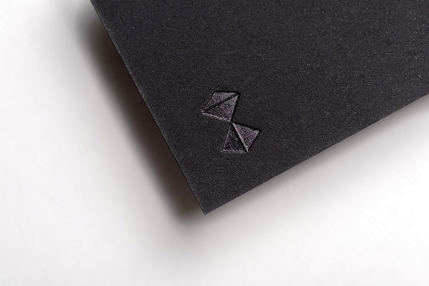 black paper business card with black foil