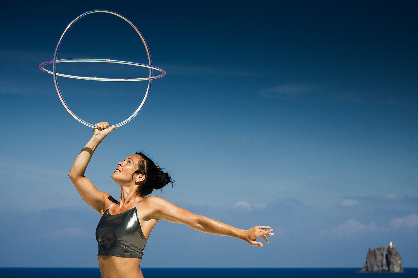 fire festival juggling hula hoop Performance street artist Stromboli sicily Italy eolian islands