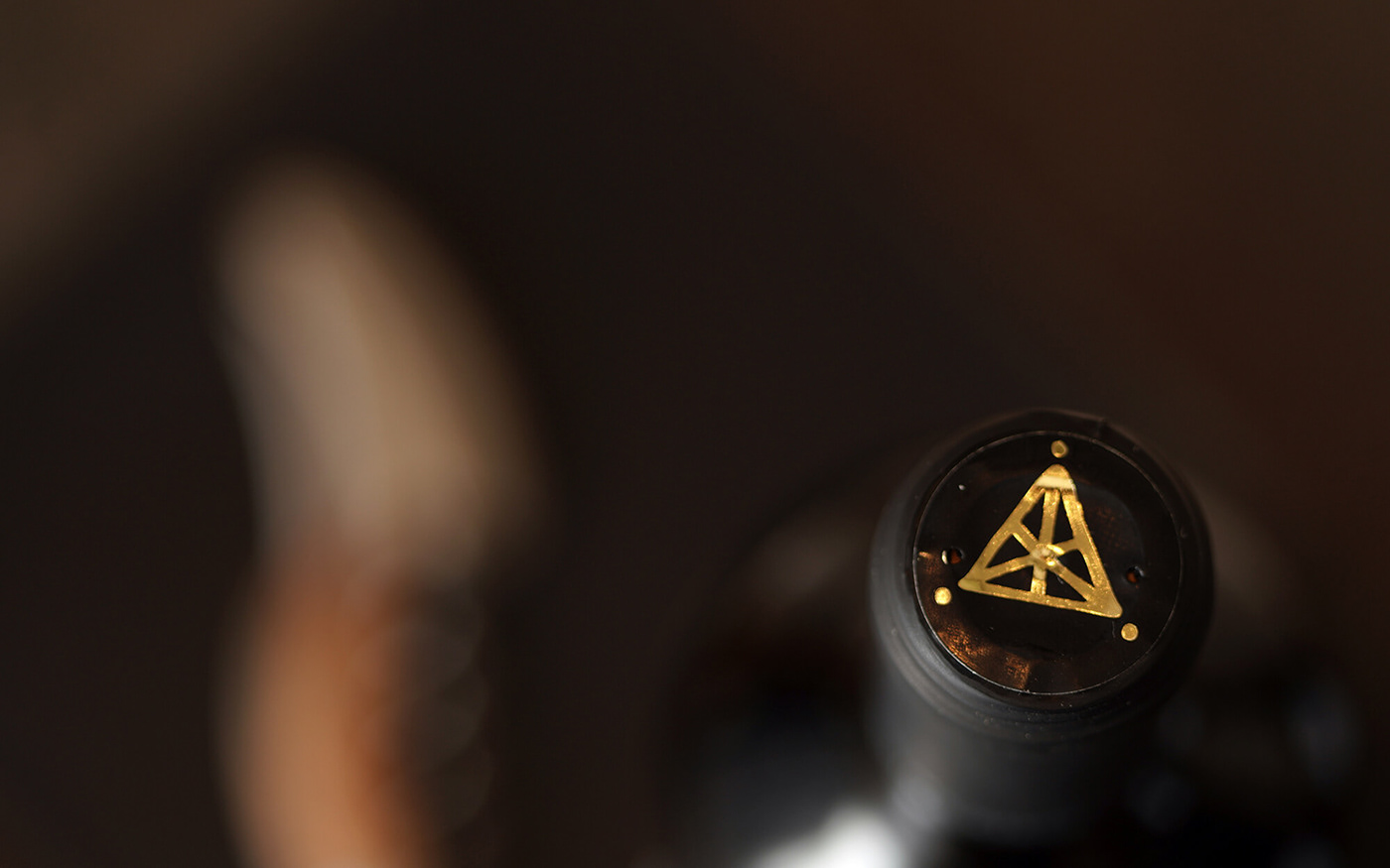 bottle gold greek Label letter k logo sophiagdotcom triangle wine winery