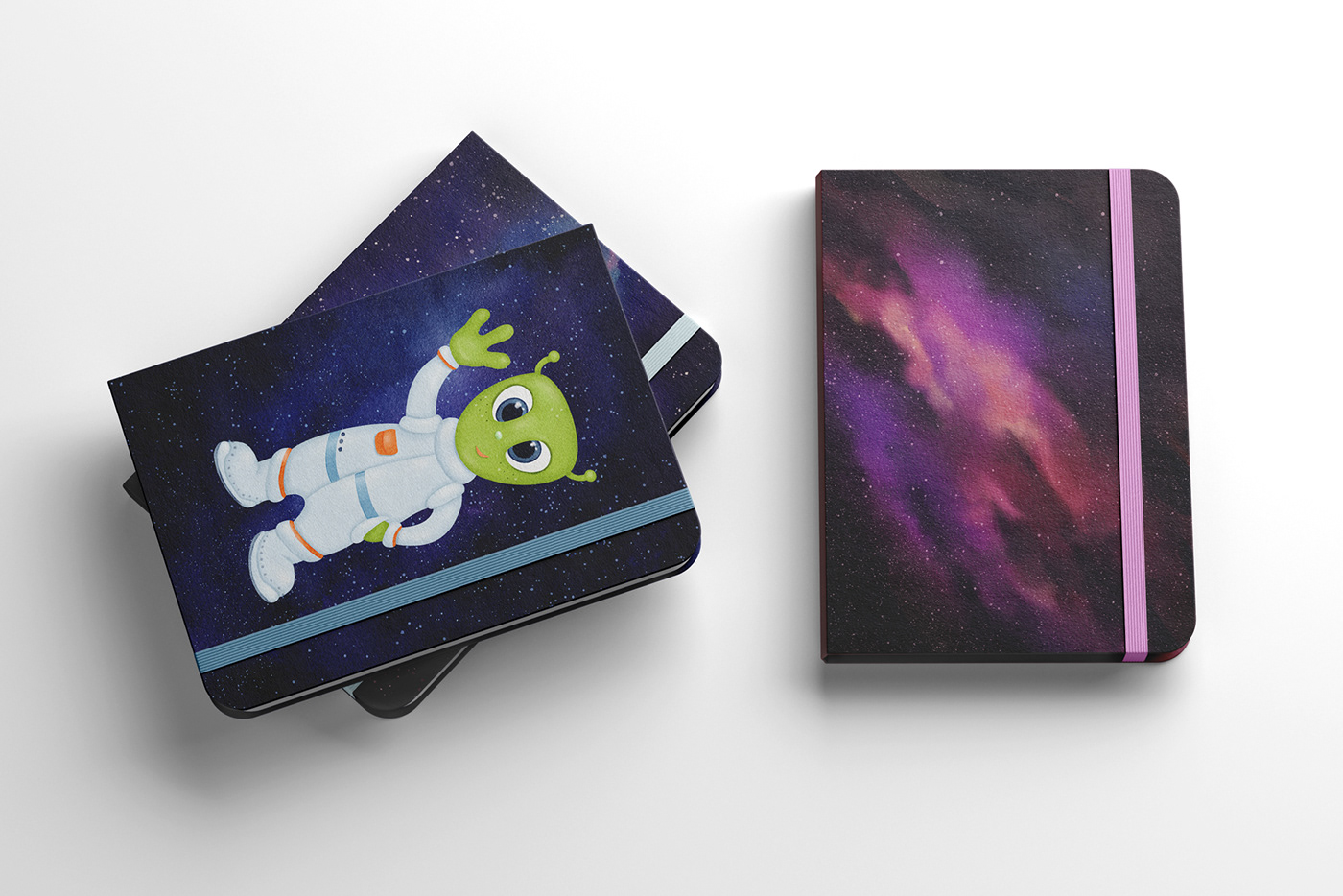 Notebooks with various covers: night sky backgrounds, aliens